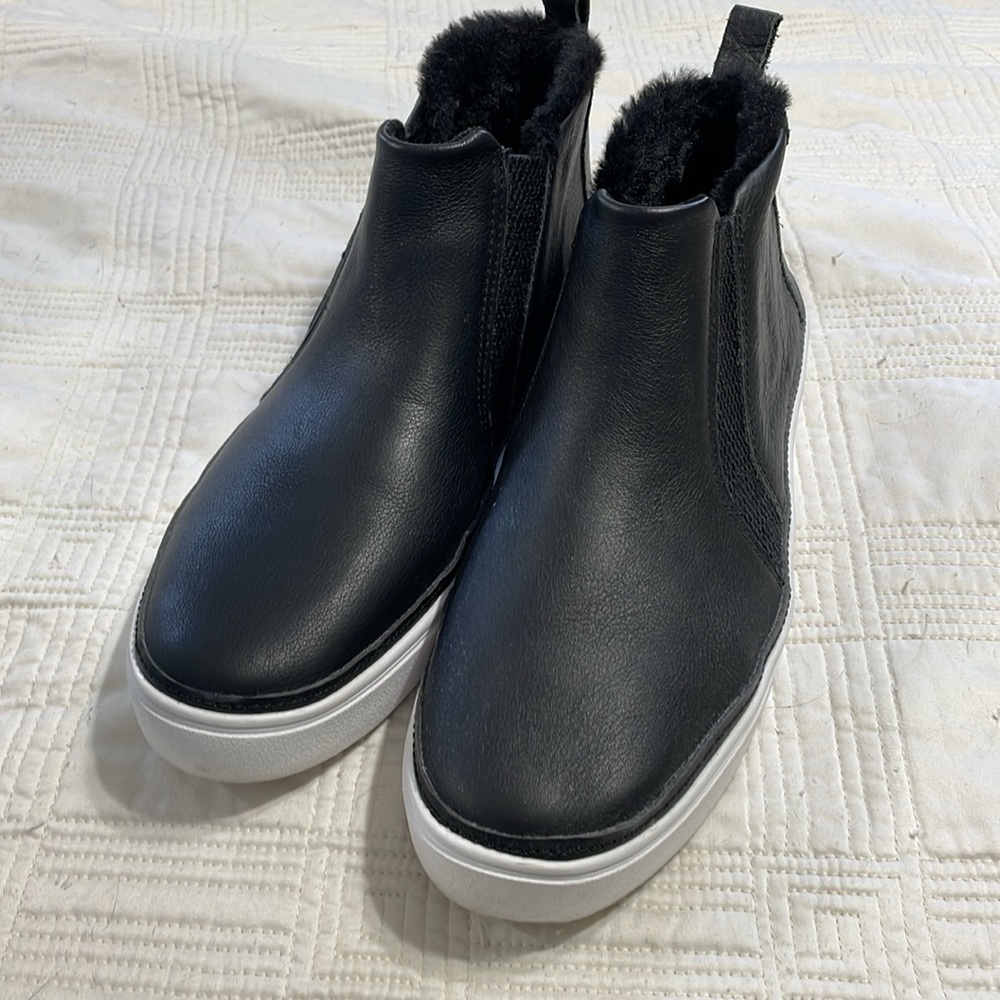 Black Toms booties.